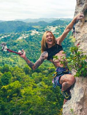 Happy climber teases us with her tits