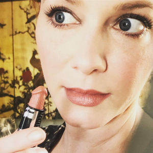 Touching up lipstick