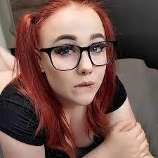 Does anyone know the name of this redhead?