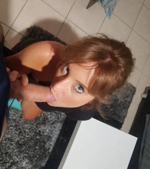 Lovely view of an amateur brunette sucking dick