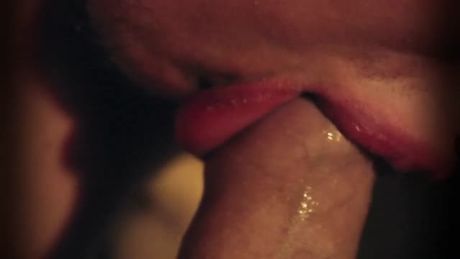 Sucking his own cock close up