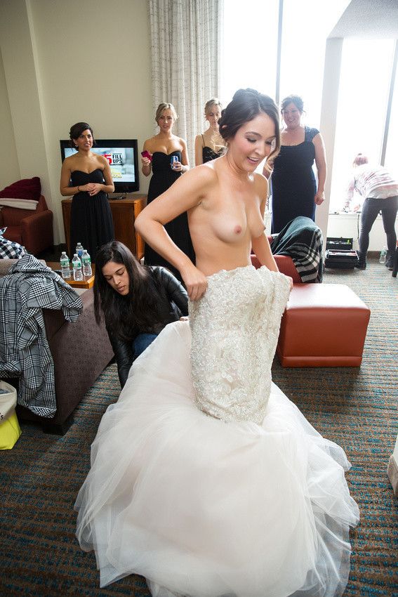 Getting into her gown