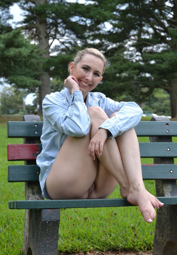 MILF flashing pussy in the park