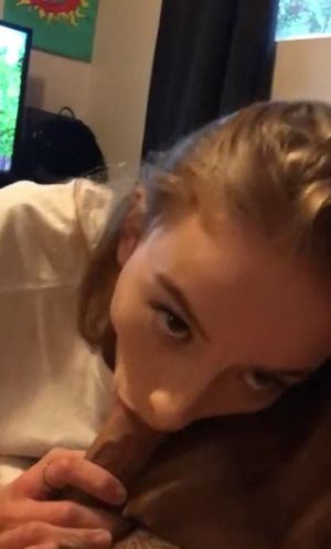 Amateur brunette teen sucking an average sized cock