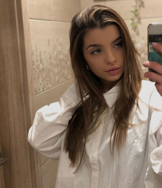 Teen in white shirt