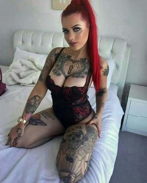 Tatted redhead