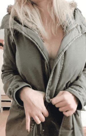Natural tits under winter jacket
