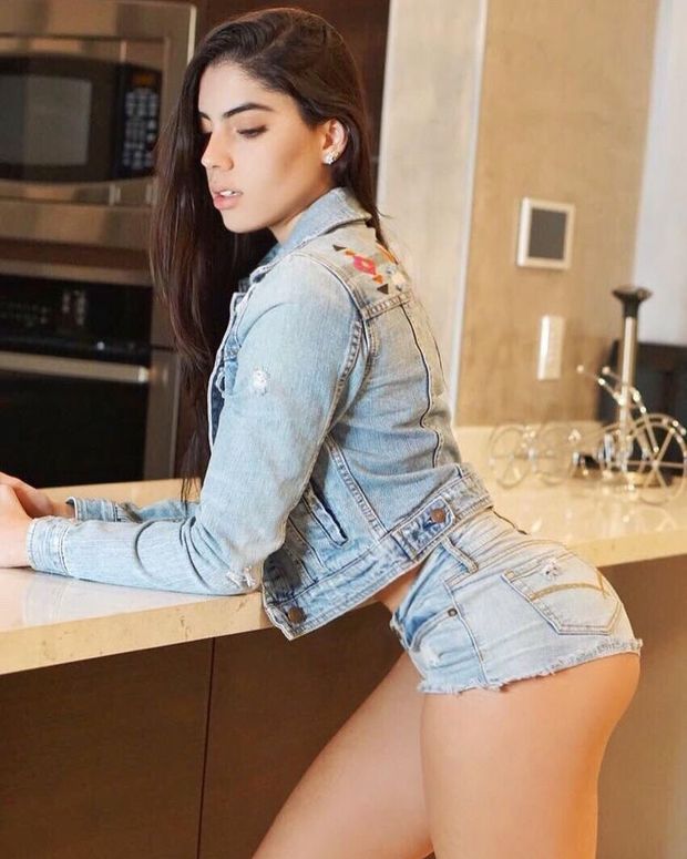 Beautiful brunette in daisy dukes