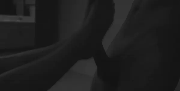 working her way around your dick with her feet