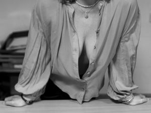 The wife poses for her boss at work. comment pls