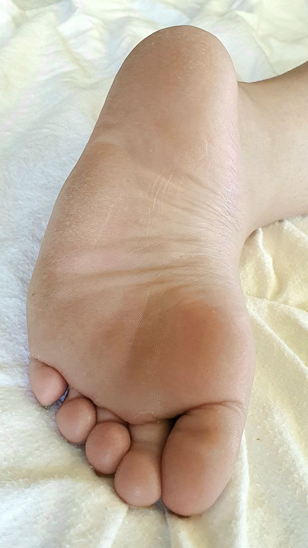 Sleeping sister soles closeup