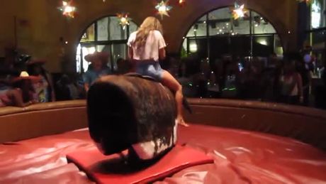 Mechanical bull riding