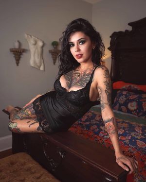 Beautiful tattooed brunette