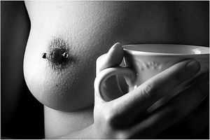 Pierced nipple and coffee
