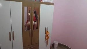 pulls down yellow panties and shows ass