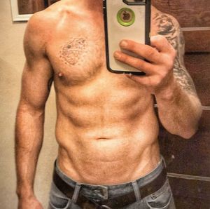 muscular inked stud hung