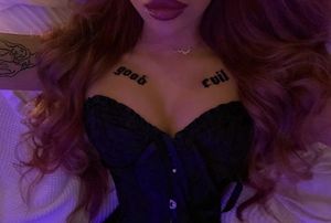 Eden shows off her bimbo lips and big tits