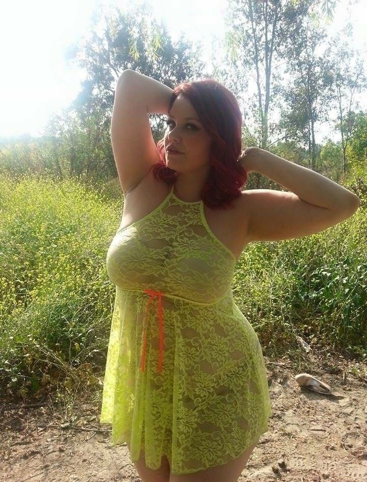 Chubby redhead in see-through dress
