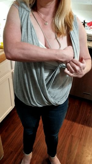 Blonde mature with a perfect tit reveal