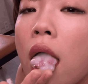 Japanese woman sheds a tear while swallowing semen.