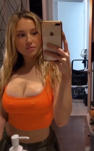 Claire orange top pokies 1