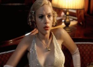 Busty babe Scarlett Johansson fixing her tits