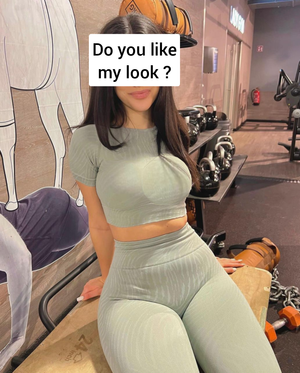 Do you like her look ? Rate and comment . She is my gf . This yoga pants shows her cameltoe cause she doesn't wear panties . Is she a slut ?