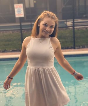 cutie white dress by the pool