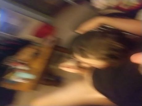 Blowjob and hand job while watching TV