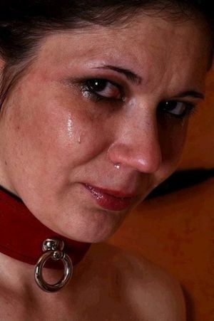 Mature female slave after being used in all holes by her younger master.