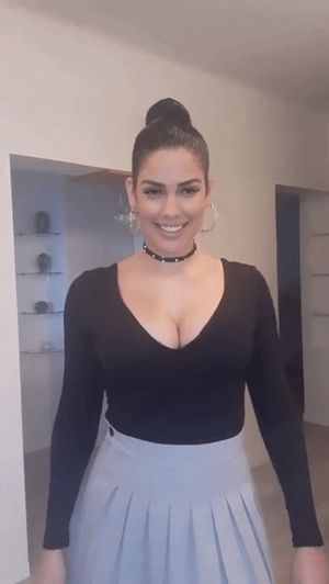 Eli Oyarzabal - dancing in a skirt & low-cut top