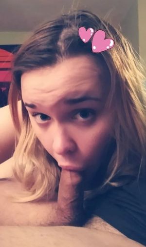 Amateur brunette teen sucking on an average-sized dick