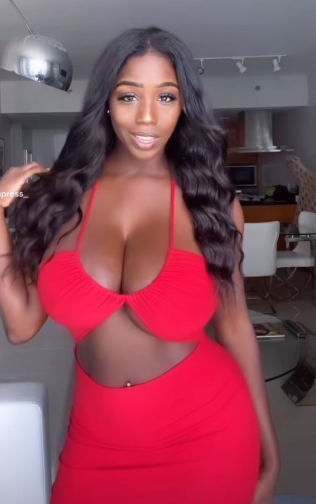 Ellie Mae red dress cleavage
