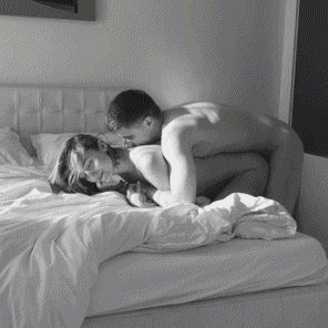 Embraced from behind