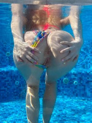 Babe showing off her holes in the pool