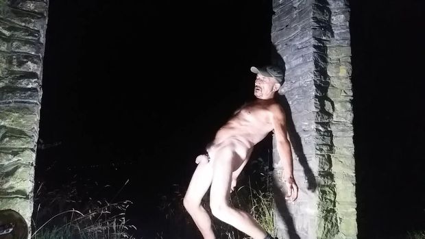 Naked male outside in public place