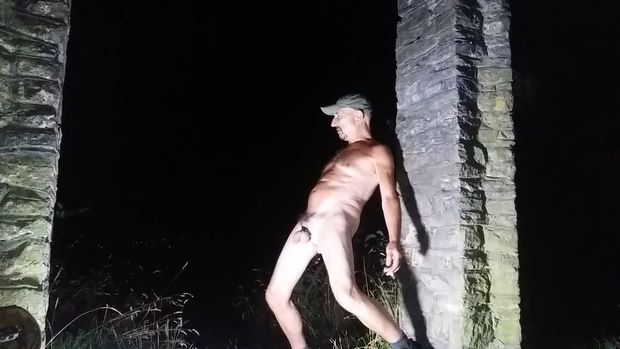 Naked male outside in public place