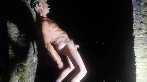 Naked male outside in public place