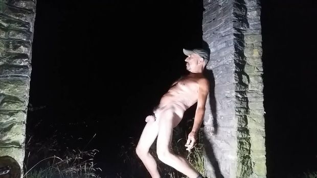 Naked male outside in public place