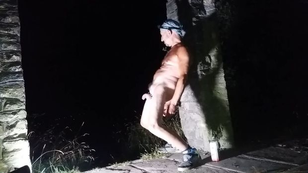 Naked male outside in public place