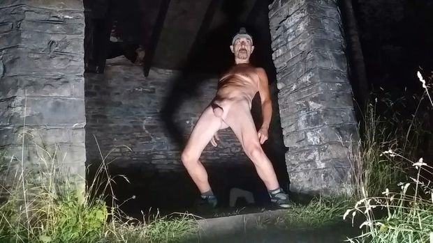 Naked male outside in public place
