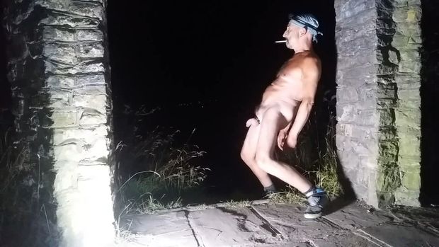 Naked male outside in public place
