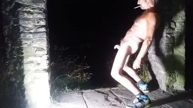 Naked male outside in public place