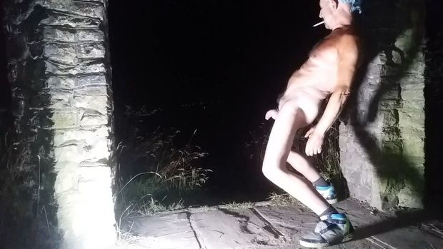 Naked male outside in public place