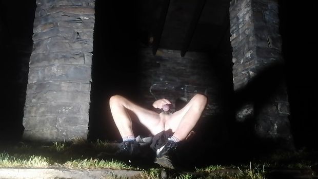 Naked male outdoors in public place