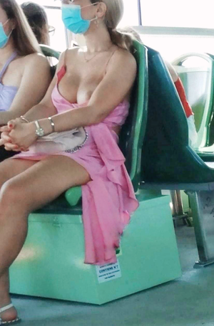 Accidental (or not?) tit flash in bus