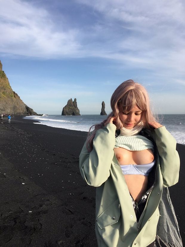 Tit flash.  Nips look hard in the cold.