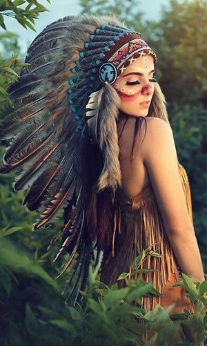 Beautiful squaw with headdress and warpaint