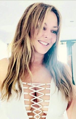 Carol cleavage white string top