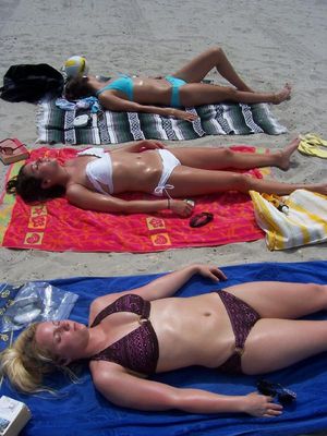 Teens sunbathing